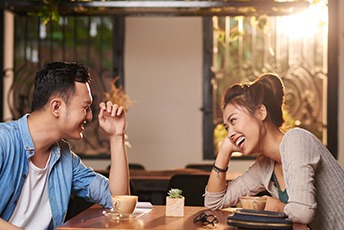 Invisalign patient in Des Plaines smiling on a date