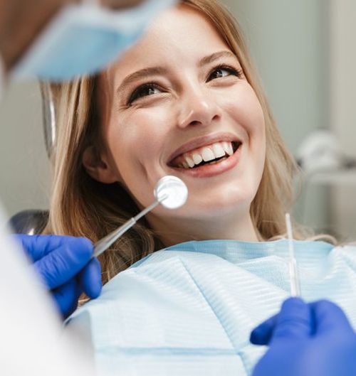 Patient smiles at dentist