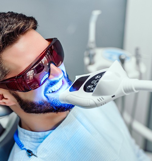 Man having his teeth whitened